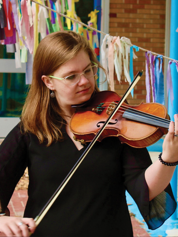 Sept25-Image Person playing fiddle